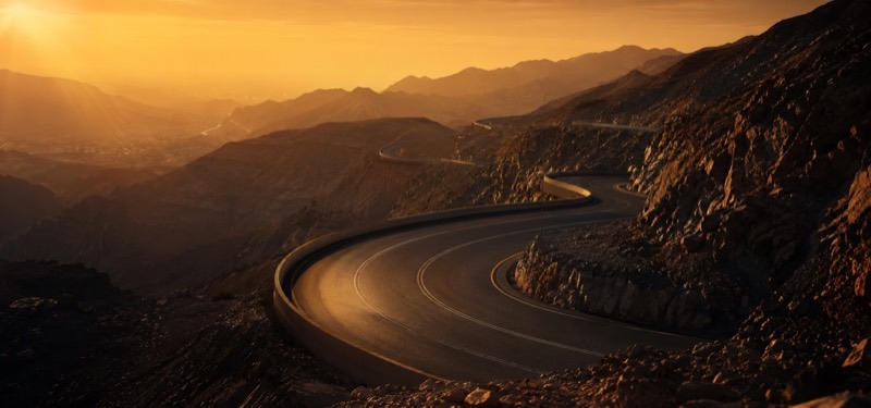 Luxury car on the Jebel Jais mountain road, one of Dubai's best scenic drives