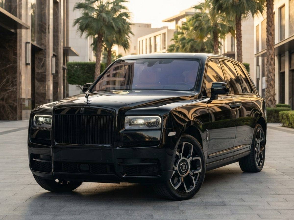 Rolls-Royce Cullinan 2026 side profile with doors open, yellow interior
